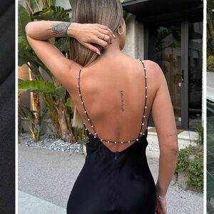 Black less dress with pearl detail